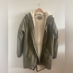 Hooded “Obey Worldwide” military jacket w cream shearling lining. Size medium.